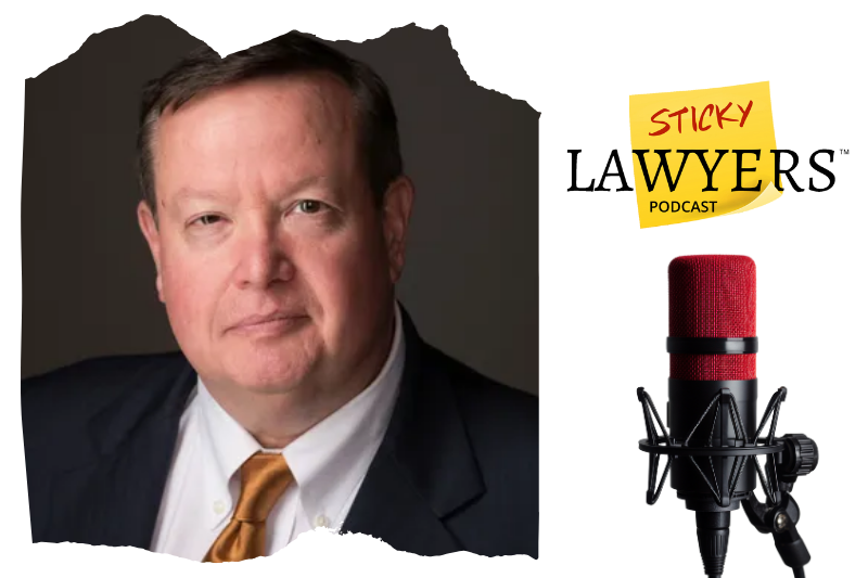 A man in a suit and yellow tie poses for a portrait. To the right, the Sticky Lawyers Podcast logo and a red microphone are visible on a white background.